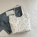 Floral canvas tote bag with red strawberry prints and comfortable wide shoulder straps - Strawberry