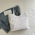 White floral canvas tote bag with purple flower patterns and grey bow details - Flower