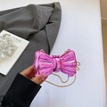 Mini metallic bow shoulder bag in vibrant magenta pink finish with gold chain strap - Rose Red