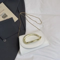 Elegant white crossbody bag with gold D-shaped handle and sleek snake chain strap - White
