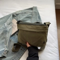 Olive green nylon crossbody bag with multi-zipper pockets and adjustable strap - Green