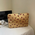 Vibrant yellow laptop sleeve with red cherry pattern and secure dual silver zippers - Gold