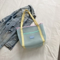 Light blue mesh tote bag with yellow straps and vibrant color-block edges - Blue