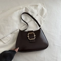 Borsa sottobraccio vintage in pelle verniciata marrone scuro con fibbia dorata su bianco - Marrone Scuro