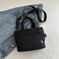Black nylon crossbody tote bag for kids with adjustable strap and metal M logo - Black