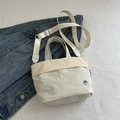 Minimalist creamy white pleated crossbody bag for children with adjustable strap - White