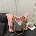 Roze canvas shopper met vlinderprint, bruine riemen en gerafelde randen aan de top - Roze