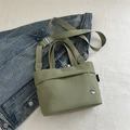 Minimalist kids' crossbody bag in sage green nylon with adjustable wide strap - Green