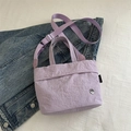 Minimalist lavender kids' crossbody bag with crinkled texture and adjustable strap - Purple