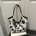 Bolso tote retro con estampado de vaca, lazo negro y correas de hombro largas - Negro