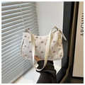 Detail of white leather hobo bag with floral patterns and adjustable shoulder strap - Multicolor Flower