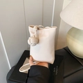 Minimalist cream white crossbody phone bag with artistic rope knot handle design - White