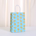Light blue paper gift bag with cute yellow duck pattern and sturdy white paper handles - Party Hat Duck Pattern (486-6) / 21*15*8cm