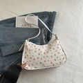 Weiße Schultertasche mit rotem Kirschmuster und dünnem Riemen auf Denim-Stoff - Kirsche