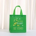 Green non-woven shopping bag with puzzle ribbon print and BE CALM motivational slogan - BE CALM Puzzle Ribbon Style (5028-2)