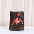 Halloween black gift bag featuring a bold red spider and white web with white handles - Black Base Red Spider Style (525-1)