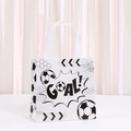 Detail of soccer themed gift bag featuring a bold GOAL design on white non-woven fabric - Geometric Honeycomb Soccer Style (9040-6)