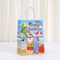 Detail of Christmas paper gift bag with tropical Santa surfing print and white rope handles - Santa Surfing Style (533-1) / 21x15x8cm