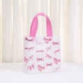 Waterproof non-woven gift bag with cute pink bow print and sturdy pink handles - White Small Bow Print Style (9038-6)