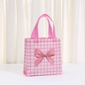 Pink checkered non-woven gift bag featuring a silky bow and durable double handles - Pink Checkered Big Bow Style (9038-2)