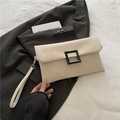 Chic beige underarm bag with a minimalist square buckle and matching wristlet strap - White