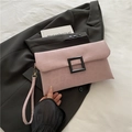 Pink leopard embossed underarm bag with large black buckle and matching wrist strap - Pink