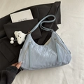 Light blue slouchy hobo shoulder bag with silver zippers and plush charm detail - With Pendant / Blue
