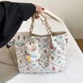 White quilted tote bag with cute cartoon prints, gold chain, and plush bear charm - With Pendant / White