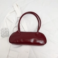 Minimalist burgundy baguette bag in glossy faux leather with slim shoulder strap - Red Brown