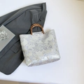 Floral embroidery tote bag with bamboo handles and silver jacquard fabric details - Purple