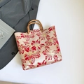 Pink floral tote bag with natural bamboo handles and vintage flower patterns - Red