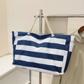 Large striped canvas tote beach bag with white rope handles for outdoor travel and shopping - Blue