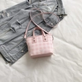 Pink and white checkered crossbody bucket bag with dual handles and adjustable strap - Pink