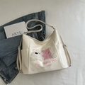 Borsa a tracolla bianco crema con ricamo a cucciolo e tracolla regolabile su tessuto - Bianco Sporco
