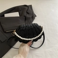 Elegant black shell-shaped handbag with snake pattern, pearl handle and shoulder strap - Black