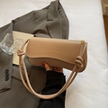 Minimalist beige leather baguette underarm bag with decorative rope knots and gold logo - Pink