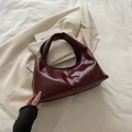 Minimalist burgundy hobo bag in polished glossy leather for daily commute - Red