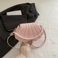 Pink shell-shaped crossbody bag with pearl handle and snake skin texture leather - Pink