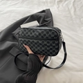 Crossbody bag featuring vintage grey M-letter pattern and adjustable black strap - Black