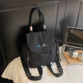 Chic black nylon backpack featuring Ai Mei embroidery and adjustable shoulder straps - Black