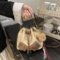 Khaki canvas bucket bag with brown leather trim, drawstring closure and bear charm - White With Pendant
