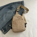 Khaki nylon crossbody sling bag with metallic M logo and adjustable shoulder strap - Khaki