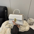 Glossy white patent leather shoulder bag with gold hardware and top handle for women - White