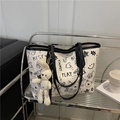 White graffiti tote bag with large capacity and cute bunny pendant for women - Black With Rabbit Pendant
