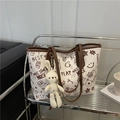 Stylish large white tote bag with graffiti prints and a cute plush bunny pendant - Coffee With Rabbit Pendant