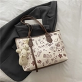 Chic cream tote bag with graffiti prints, brown leather straps and white rabbit charm - With Pendant / Brown