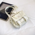 Minimalist cream white canvas messenger bag with adjustable strap and buckle design - White
