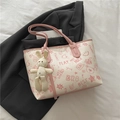 Off-white tote bag with pink graffiti prints and a cute plush rabbit keychain accessory - With Pendant / Pink