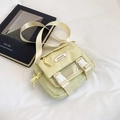 Minimalist creamy yellow messenger bag in nylon with stylish front mesh pocket - Yellow