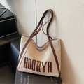 Large beige canvas tote bag with brown leather handles and HOORYA logo for daily commute - Brown